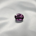 oval shape amethyst gemstone dark color